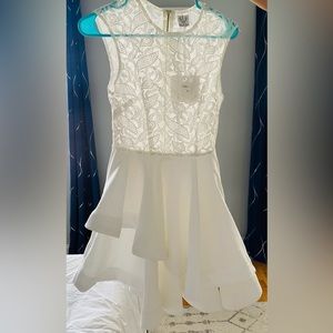 Brand new cute white skater dress in size 2-4